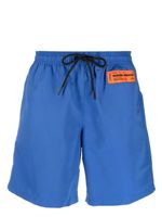 Heron Preston short de bain à patch logo - Bleu - thumbnail