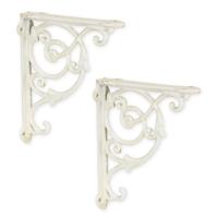 A PAIR OF CAST IRON WALL BRACKETS