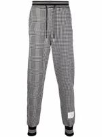 Thom Browne pantalon de jogging à motif pied-de-poule - Noir