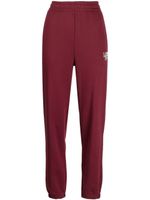 Lacoste pantalon de jogging à logo imprimé - Rouge