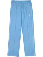 Sporty & Rich pantalon de jogging à logo Runner imprimé - Bleu