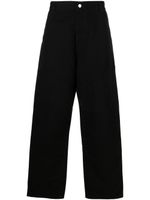 Carhartt WIP pantalon ample à patch logo - Noir