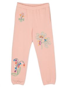 Stella McCartney Kids pantalon de jogging en coton à fleurs brodées - Rose