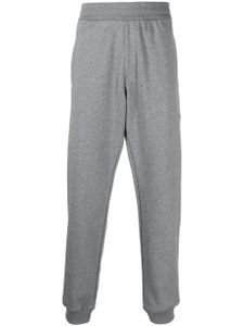 Versace pantalon de jogging slim à logo imprimé - Gris