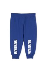 Versace Kids pantalon de jogging fuselé à imprimé Greca - Bleu