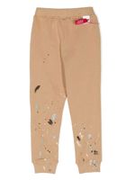 Mostly Heard Rarely Seen 8-Bit pantalon de jogging à effet taches de peinture - Marron