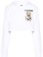 Moschino hoodie zippé à motif graphique - Blanc