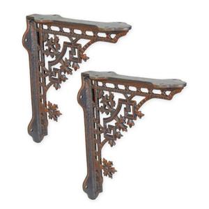 A PAIR OF CAST IRON WALL BRACKETS