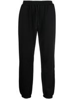 MSGM pantalon de jogging en coton à logo imprimé - Noir