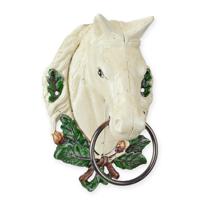 A CAST IRON WHITE HORSEHEAD TOWEL HOLDER