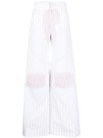 Off-White pantalon rayé à coupe ample - Blanc