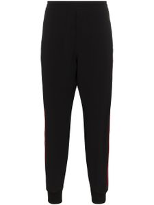 Alexander McQueen pantalon de jogging à bande logo - Noir