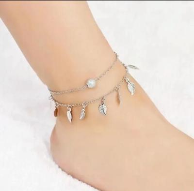 Zilverkleurig Dubbel Enkelbandje met Bladeren Bedels - Sieraden - Spiritueelboek.nl Zilverkleurig Dubbel Enkelbandje met Bladeren Bedels - Sieraden - Spiritueelboek.nl