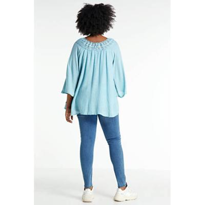 Zhenzi semi-transparante top Popy met vleermuismouwen lichtblauw Zhenzi semi-transparante top Popy met vleermuismouwen lichtblauw