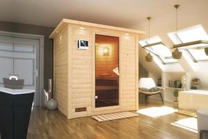 Karibu | Mojave Sauna met Dakkraag | Bronzeglas Deur | Kachel 9 kW Externe Bediening