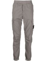 Stone Island pantalon de jogging à appliqué Compass - Gris