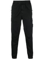 Stone Island pantalon fuselé à poches cargo - Noir