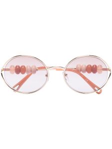 Chloé Eyewear lunettes de soleil à monture ovale perlées - Rose