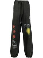 Maison MIHARA YASUHIRO pantalon de jogging à slogan imprimé - Noir