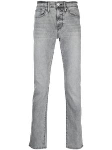 FRAME jean skinny à taille basse - Gris