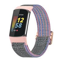 By Qubix - Compatible met Fitbit Charge 5 - Fitbit Charge 6 - Elastisch nylon bandje - Roze - Compatible fitbit bandje