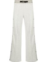 Moncler Grenoble pantalon de jogging boutonné en polaire - Gris