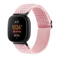 By Qubix - Compatible met Fitbit Versa 3/4 & Sense 1/2 Nylon loop bandje - Roze - Compatible fitbit bandje