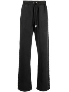 Off-White pantalon de jogging à détails d'œillets - Noir