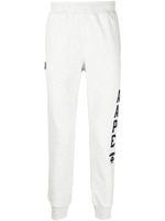 AAPE BY *A BATHING APE® pantalon de jogging slim à logo imprimé - Gris