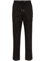 Dolce & Gabbana pantalon de jogging à plaque logo - Noir