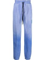 AMIRI pantalon de jogging à effet délavé - Bleu