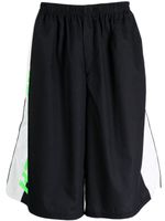 Haider Ackermann short de sport en coton à logo imprimé - Noir