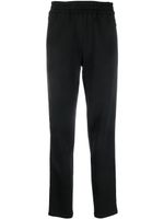 Emporio Armani pantalon de jogging à bandes logo - Noir