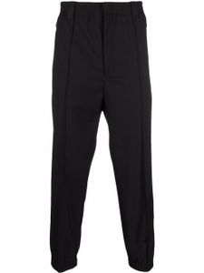 Emporio Armani pantalon de jogging à coupe courte - Noir