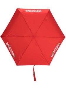 Moschino parapluie à logo imprimé - Rouge