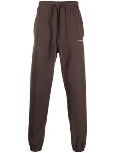 Ih Nom Uh Nit pantalon de jogging à logo imprimé - Marron