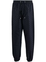 Balmain pantalon de jogging à imprimé monogrammé - Bleu