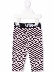 Versace Kids legging à logo imprimé all-over - Rose