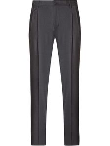 Dolce & Gabbana pantalon fuselé en laine à détails de plis - Gris