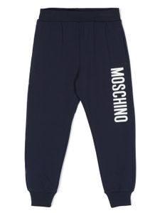 Moschino Kids pantalon de jogging fuselé à logo imprimé - Bleu