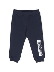 Moschino Kids pantalon de jogging en coton stretch à logo imprimé - Bleu