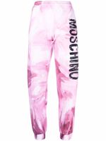 Moschino pantalon de jogging à imprimé abstrait - Rose