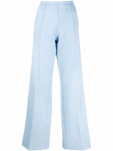 Palm Angels pantalon ample à rayures latérales - Bleu