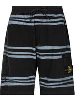 Supreme x Stone Island short à rayures - Noir