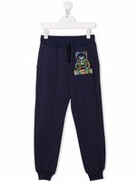 Moschino Kids pantalon fuselé à logo brodé - Bleu