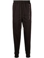 Mastermind World pantalon de jogging à logo jacquard - Marron