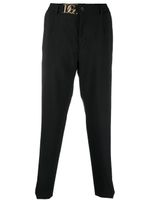 Dolce & Gabbana pantalon fuselé à boucle logo - Noir