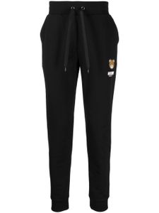 Moschino pantalon de jogging à patch logo - Noir