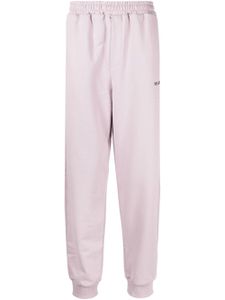 Helmut Lang pantalon de jogging fuselé à logo imprimé - Violet