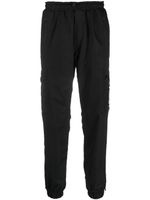 Plein Sport pantalon de jogging à logo imprimé - Noir